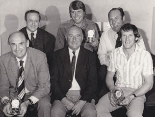 Peter Ford (front row left) together with Dick Smith (front row right) and Alan Brinn (back row centre) with the clocks presented by the club to mark their 500 appearances