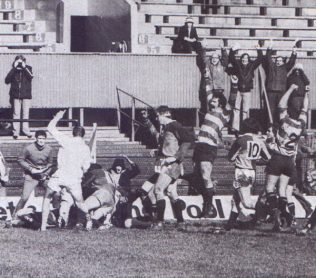 Bob Clewes, hidden under a mound of bodies, scores the winning try in the 1978 semi-final