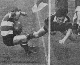 Dix turns inside Griffiths's flying tackle to score Gloucester's opening try Twickenham 1972