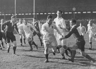 Price (centre) goes for the ball England v Wales Twickenham 1949